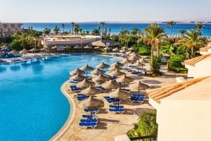 the pool, beach umbrellas and the Red Sea in Egypt